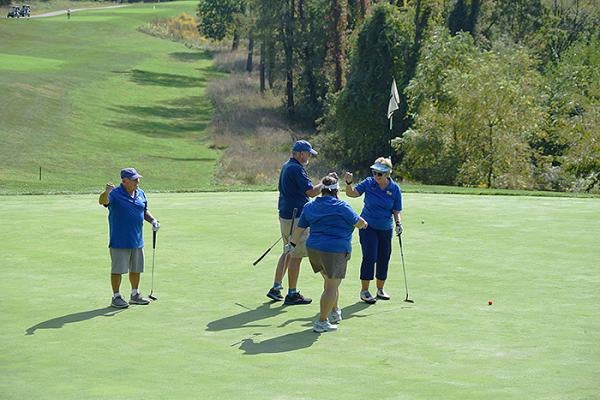 Golfers on the green at Totteridge Golf Course