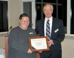 Brian Root accepting award