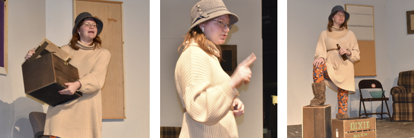 On stage: woman wearing a hat and holding a box; woman gesturing; woman holding a beer bottle.