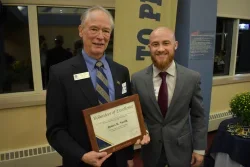 James Smith accepting award