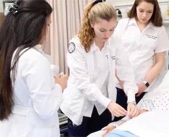 Nursing students in a simulation lab