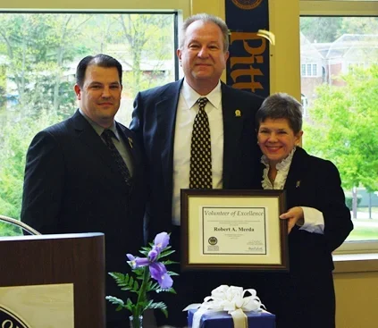 Robert Merda accepting award