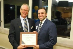 Scott Szypulski accepting award