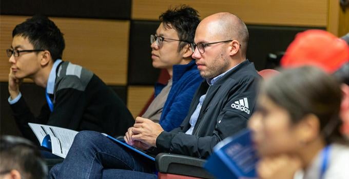 people sitting in a lecture hall